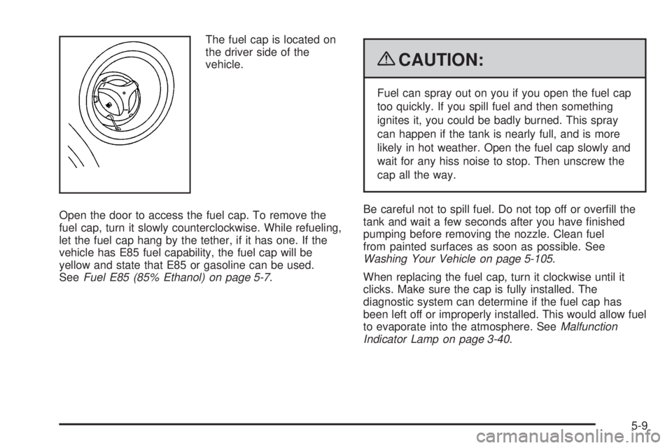 HUMMER H2 2009 User Guide The fuel cap is located on
the driver side of the
vehicle.
Open the door to access the fuel cap. To remove the
fuel cap, turn it slowly counterclockwise. While refueling,
let the fuel cap hang by the 