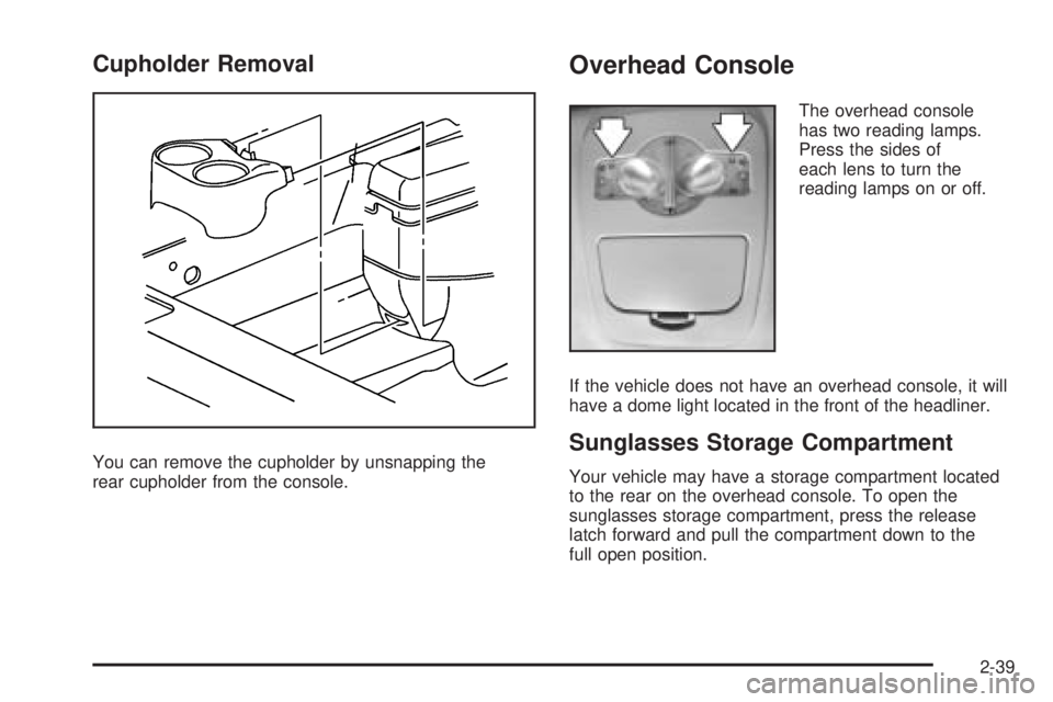 PONTIAC GRAND PRIX 2005  Owners Manual Cupholder Removal
You can remove the cupholder by unsnapping the
rear cupholder from the console.
Overhead Console
The overhead console
has two reading lamps.
Press the sides of
each lens to turn the
