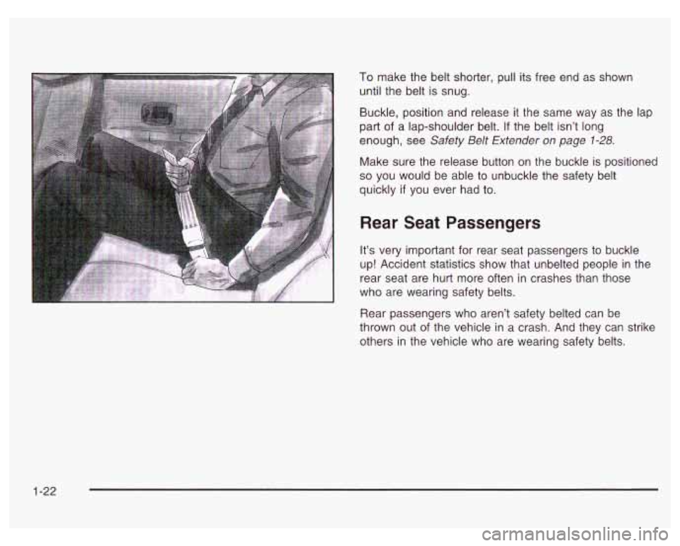 PONTIAC GRAND PRIX 2003 Owners Manual To make the belt shorter, pull its free  end  as  shown 
until the belt  is snug. 
Buckle,  position and  release 
it the  same  way  as  the lap 
part 
of a  lap-shoulder  belt. If the  belt isn’t 