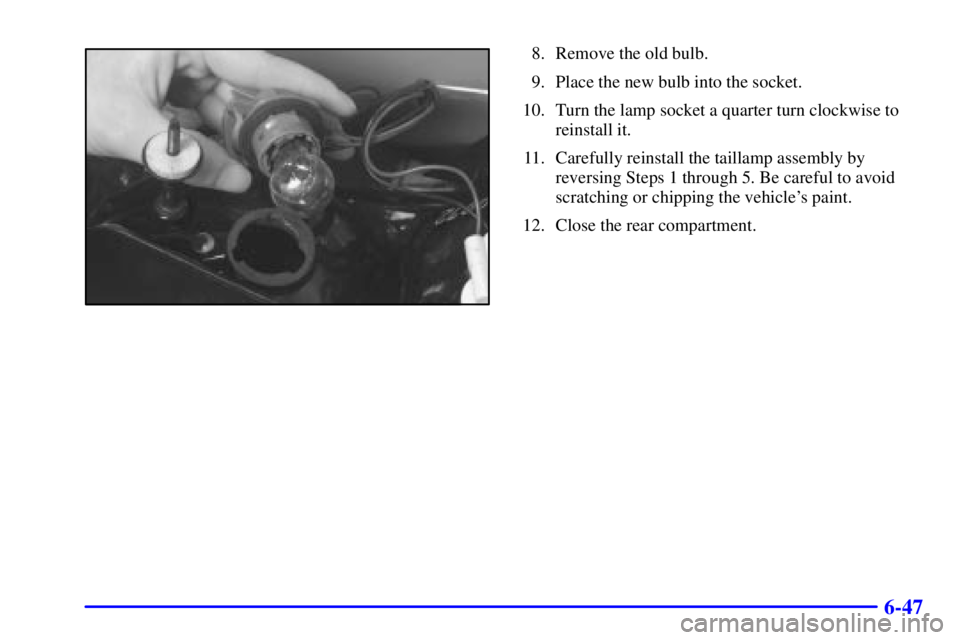 PONTIAC GRAND PRIX 2002  Owners Manual 6-47
8. Remove the old bulb.
9. Place the new bulb into the socket.
10. Turn the lamp socket a quarter turn clockwise to
reinstall it.
11. Carefully reinstall the taillamp assembly by
reversing Steps 