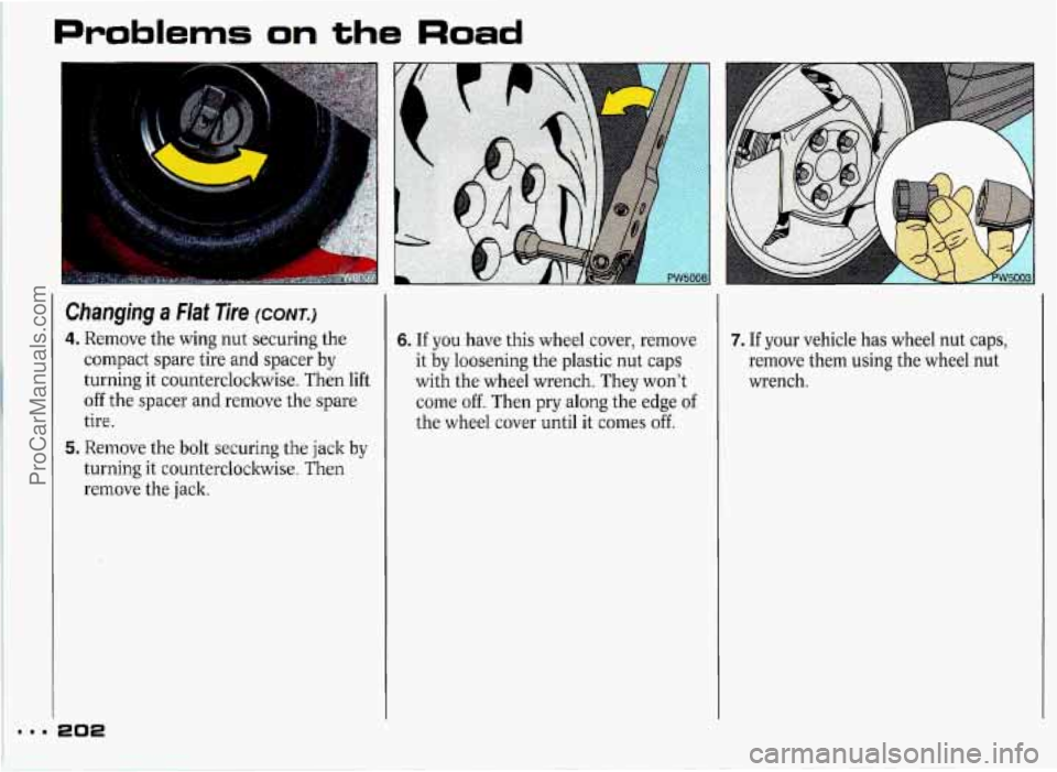 PONTIAC GRAND-PRIX 1993  Owners Manual m.. 
Problems on the Road 
Changing a Flat Tire (CONT.) 
4. Remove the wing  nut securing  the 
compact spare tire and  spacer 
by 
turning it countercloclnvise.  Then lift 
off  the  spacer  and remo